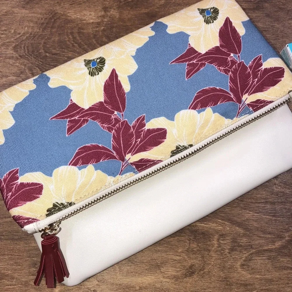 RACHEL Pally floral clutch with beauty samples